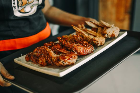 robo de salarios de Wingstop